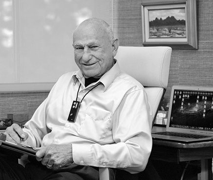 Dr. Edwin K. Yager seated in his office